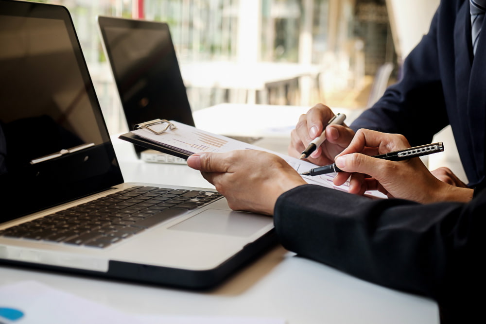 Migration adviser reviewing Australian Student visa application documents with an applicant